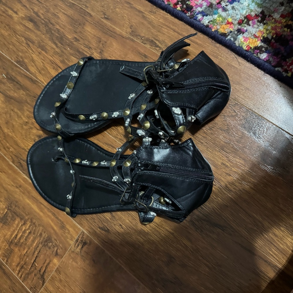 Torrid skull and grommet sandals